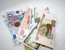 Доллар и евро подскочили на фоне снижения цен на нефть после майских праздников