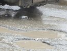Хозяйка Cadillac разбила машину из-за выбоины, но осталась должна дорожникам