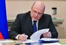 Миниатюра новости: Тройной удар по кошельку: что скрывает подпись Мишустина под документом №2019 для всех россиян